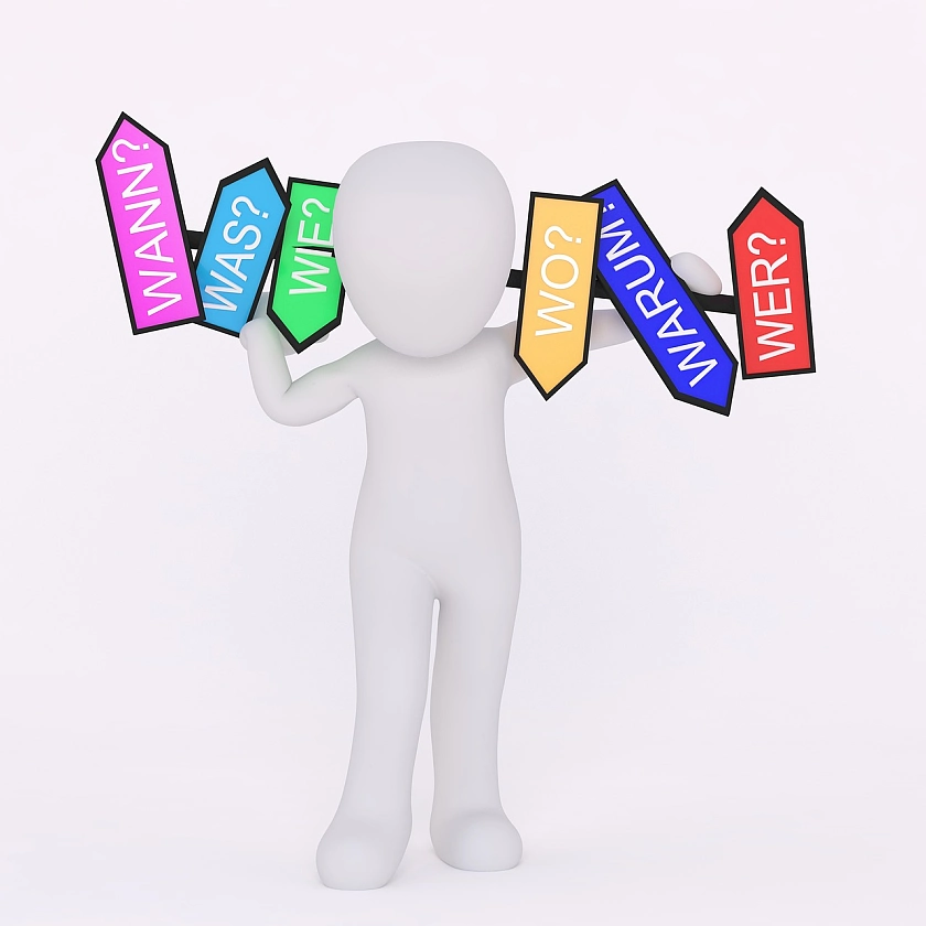 Eine Figur die Fragen mit sich trägt.