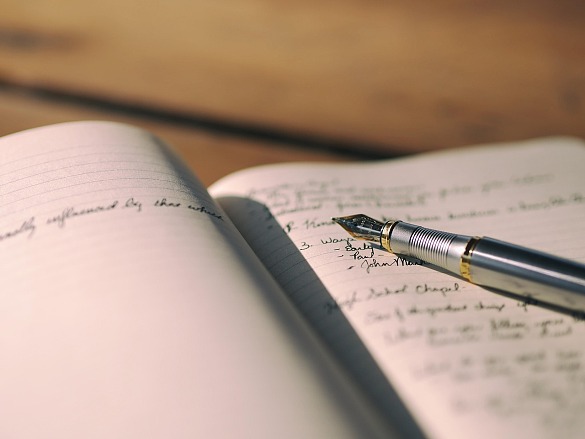 Notizheft mit Stift